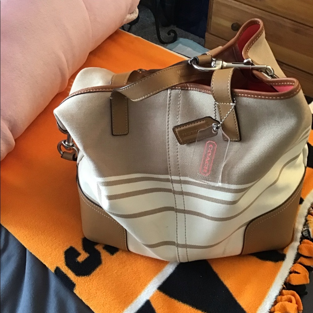 Beige/brown canvas Coach tote.